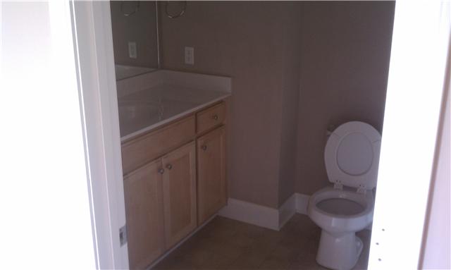 714 Lear Road Portland, TN 37148 - Photo 8 of 12 a bathroom with a sink and a mirror