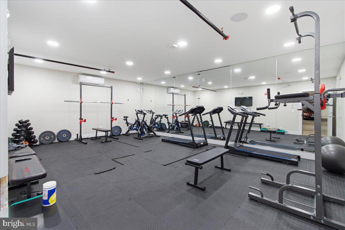 1028 Bladensburg Road Northeast, Unit 18 Washington, DC 20002 - Photo 18 of 22 a view of a room with gym equipment