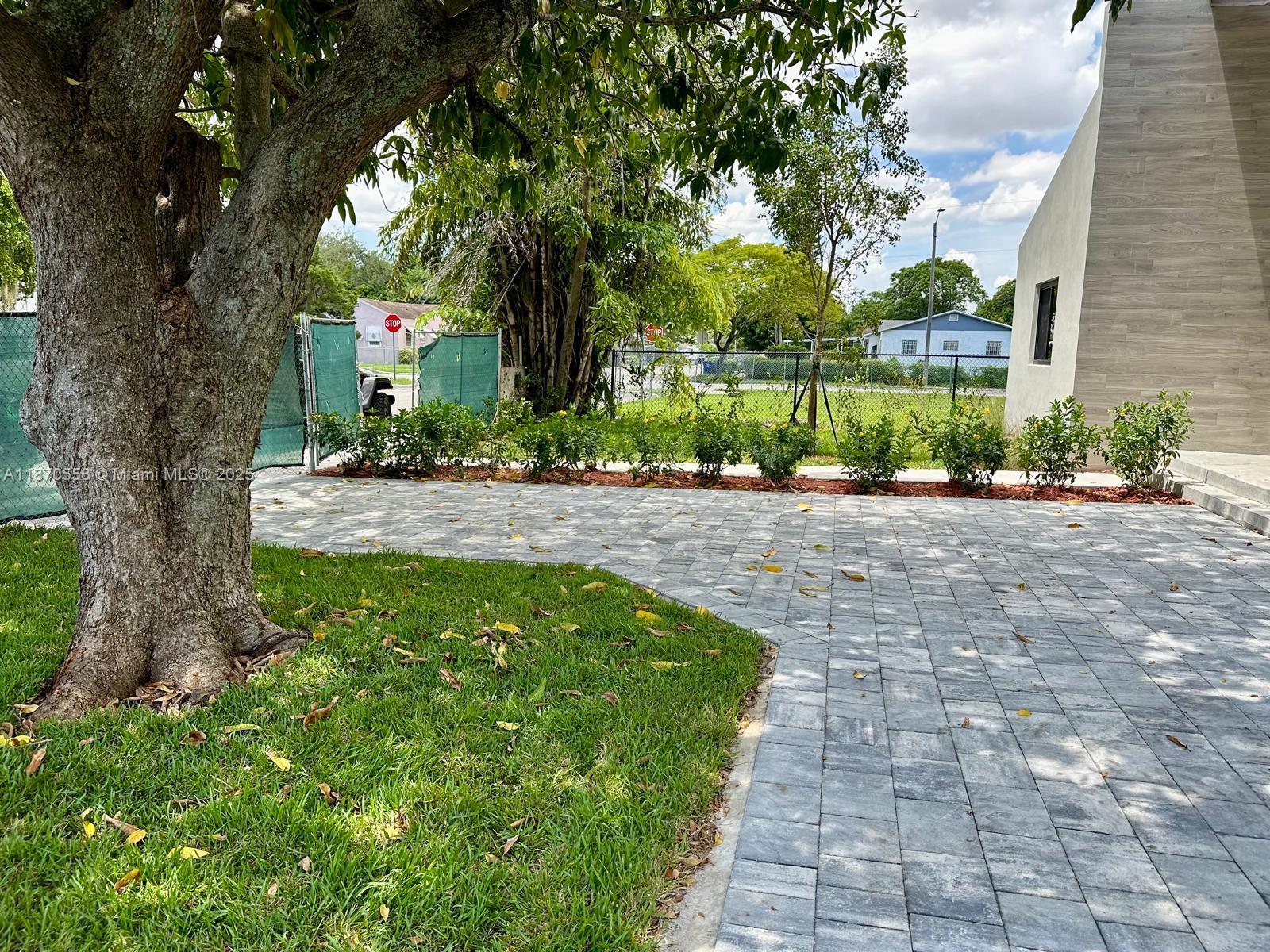 929 Northwest 60th Street Miami, FL 33127 - Photo 2 of 58 a view of a garden