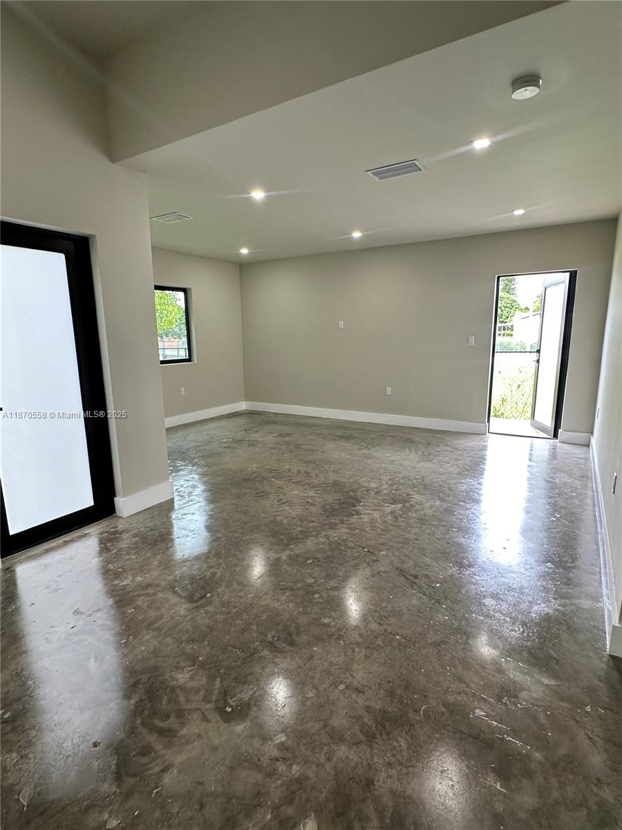 929 Northwest 60th Street Miami, FL 33127 - Photo 22 of 58 a view of a hallway