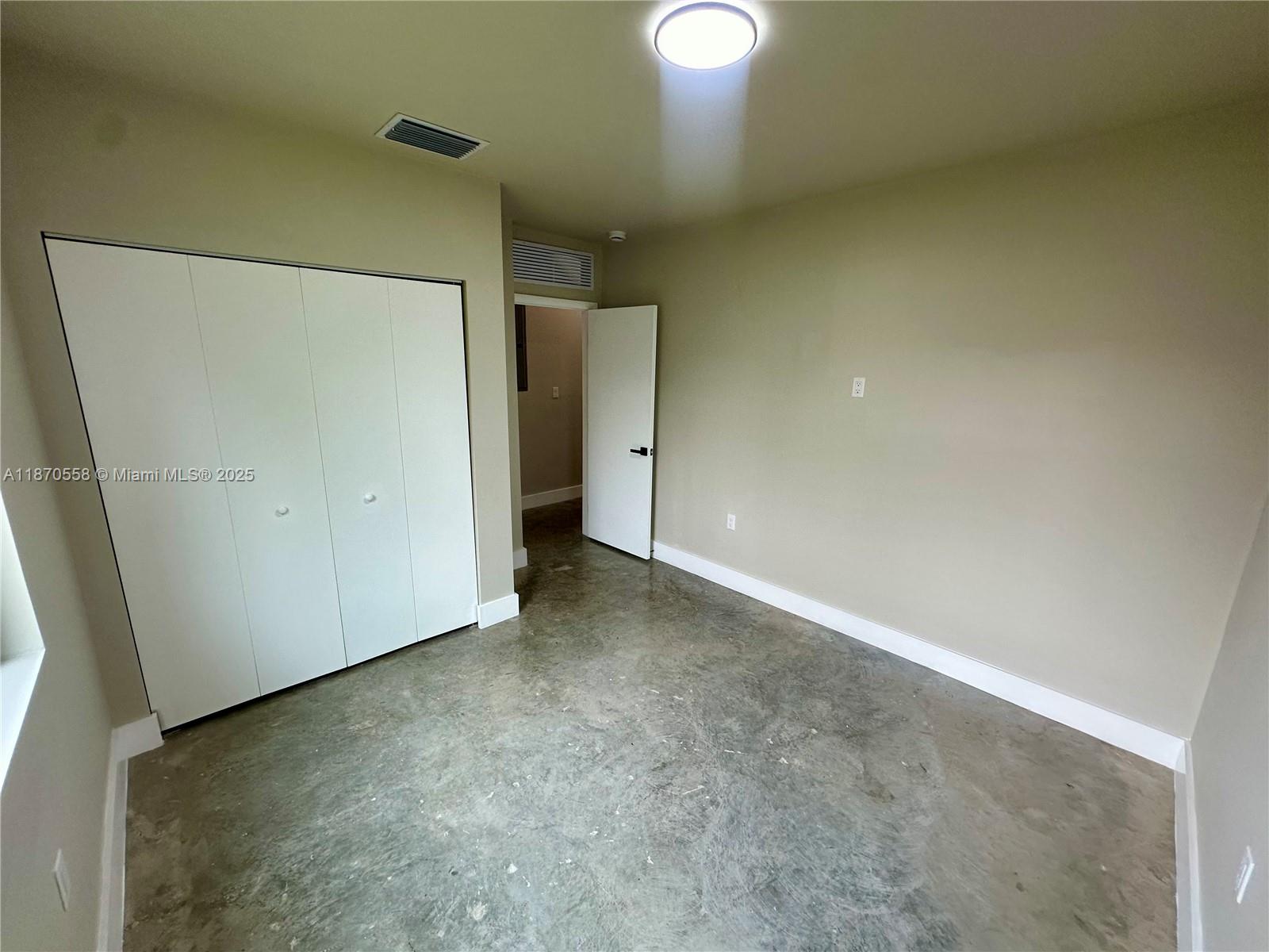 929 Northwest 60th Street Miami, FL 33127 - Photo 33 of 58 a view of an empty room