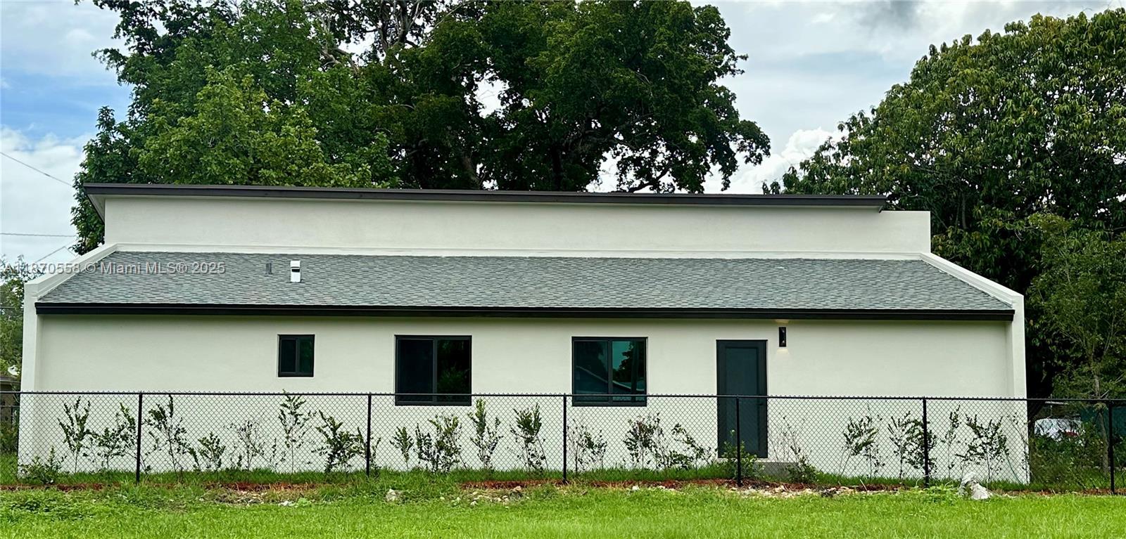 929 Northwest 60th Street Miami, FL 33127 - Photo 58 of 58 a view of a house with yard