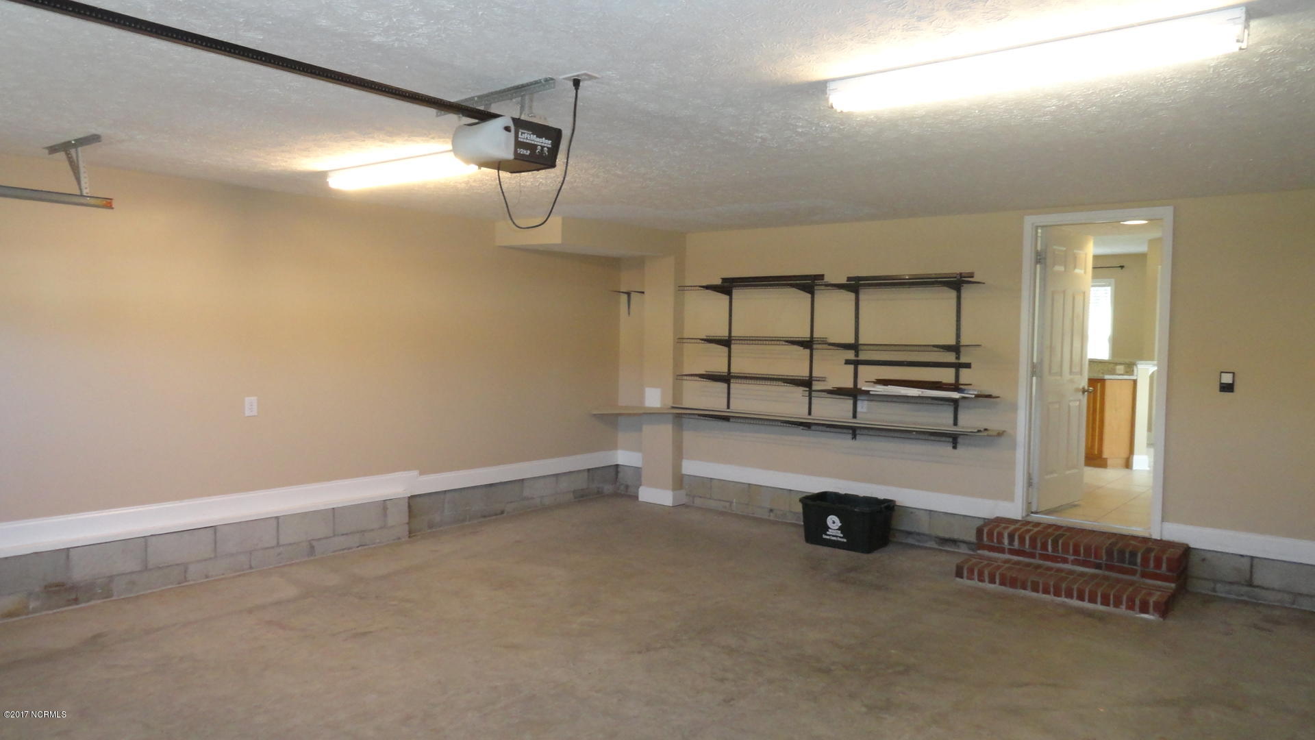 110 Sand Run Road Havelock, NC 28532 - Photo 48 of 52 Shelving in Garage