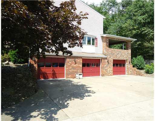 100 Shady Spring Road Economy, PA 15005 - Photo 2 of 18 Parking Lot/Garage. Huge oversized 3 stall garage with lots of parking and cement driveway. Car lovers dream.