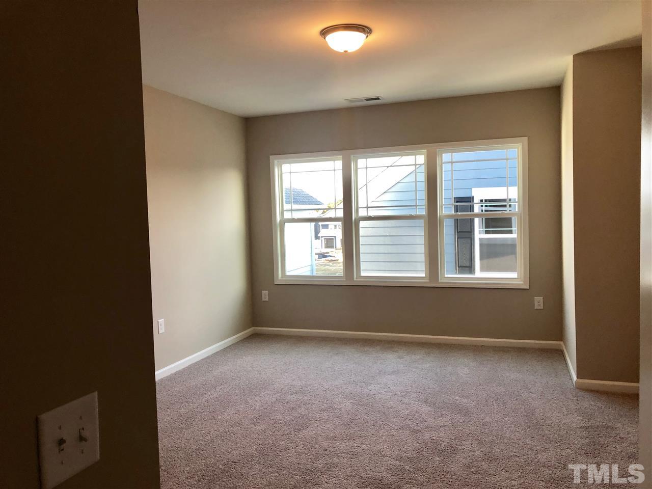 5200 Beckom Street, Unit 2204 Raleigh, NC 27616 - Photo 15 of 16 master bedroom example for this floorplan, finishes and structural details may vary.