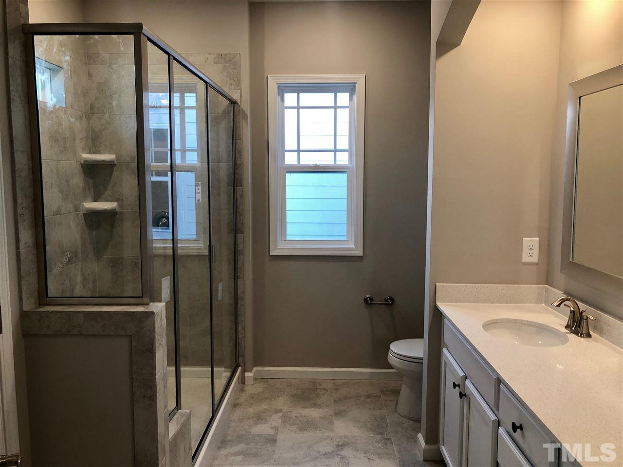 5200 Beckom Street, Unit 2204 Raleigh, NC 27616 - Photo 16 of 16 master bath example for this floorplan. Finishes and structural detail may vary