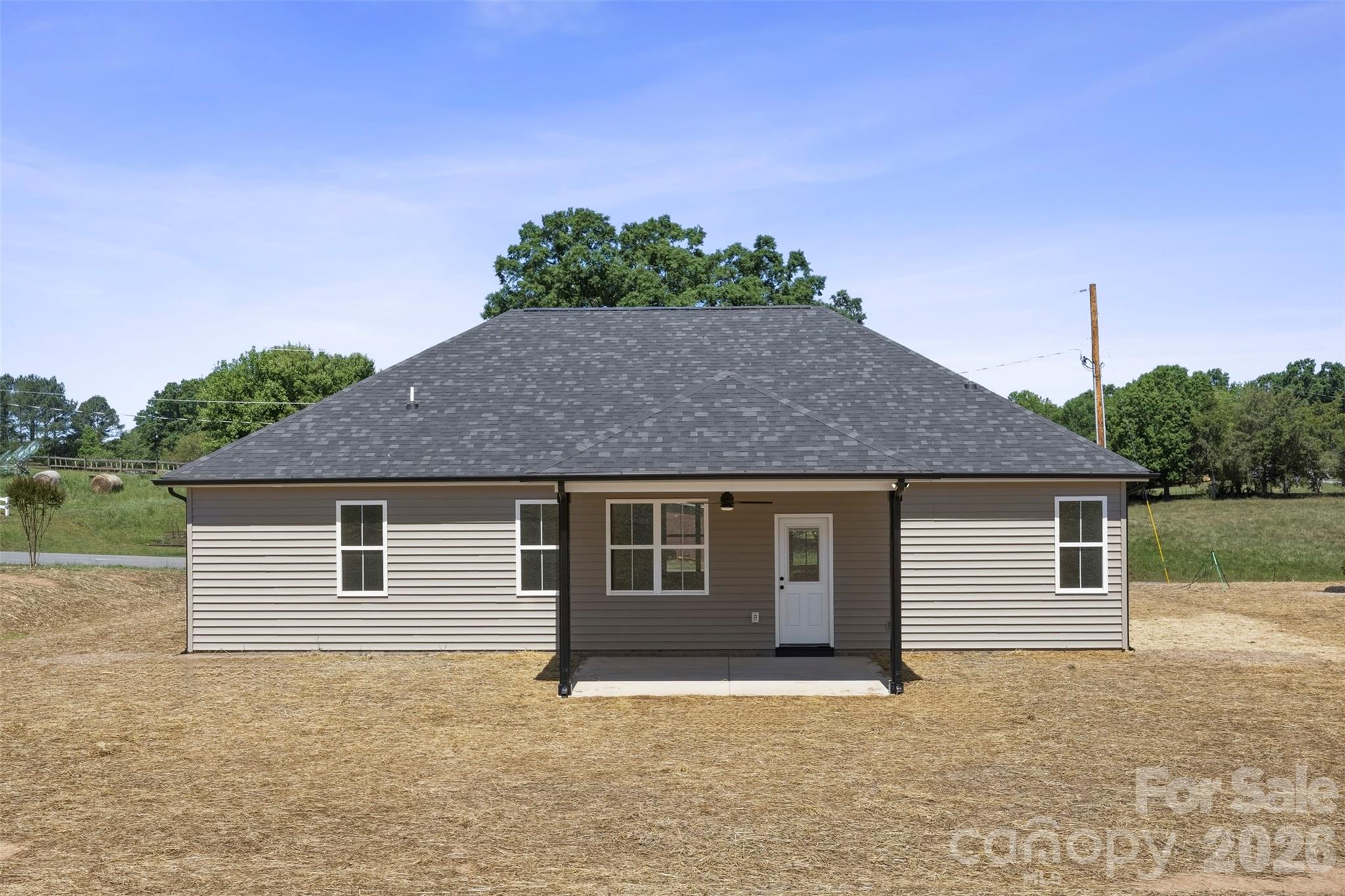 1014 Speight Road Albemarle, NC 28001 - Photo 26 of 28 a house with trees in the background