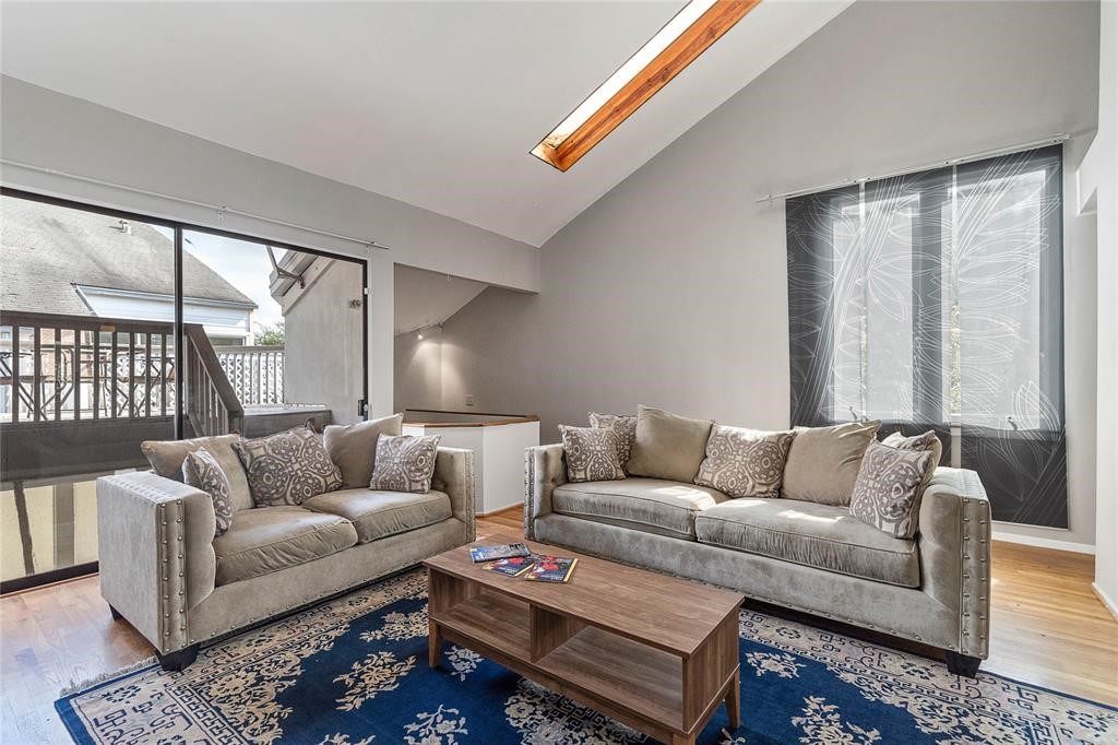 Spacious living room with a lot of natural light