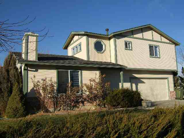 2181 Cobblestone Court Reno, NV 89503 - Photo 1 of 8 a front view of a house with garden