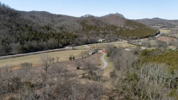 a view of a backyard of a house