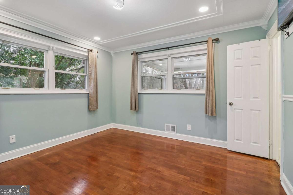 716 Carolina Roads Marietta, GA 30008 - Photo 27 of 54 a view of an empty room with a window