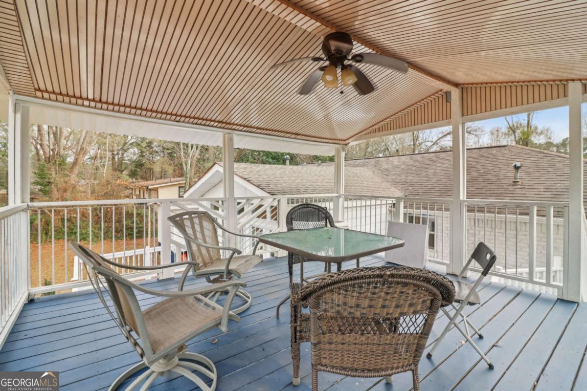 716 Carolina Roads Marietta, GA 30008 - Photo 40 of 54 a view of a dining room with furniture window and wooden floor