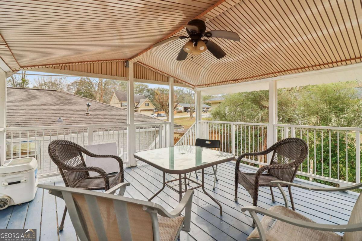 716 Carolina Roads Marietta, GA 30008 - Photo 42 of 54 a view of a chairs and table in the balcony