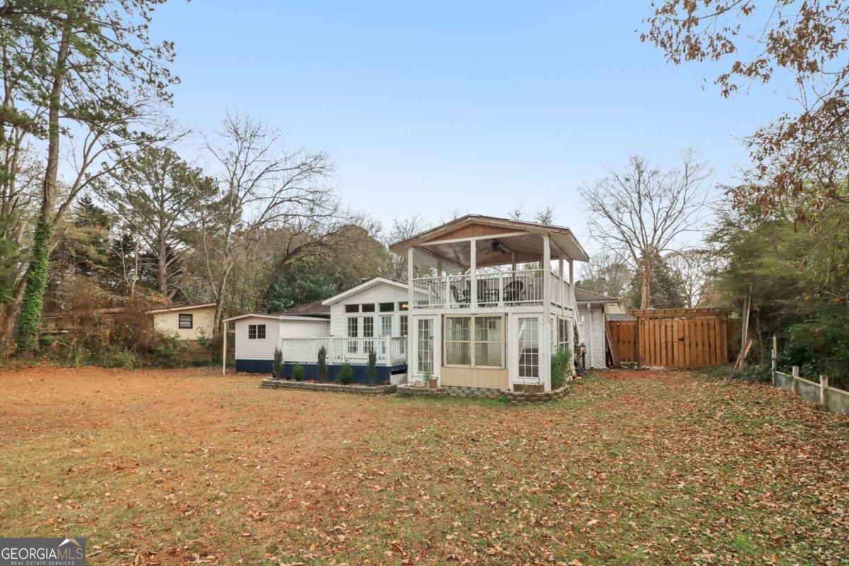 716 Carolina Roads Marietta, GA 30008 - Photo 44 of 54 a view of a house with a yard