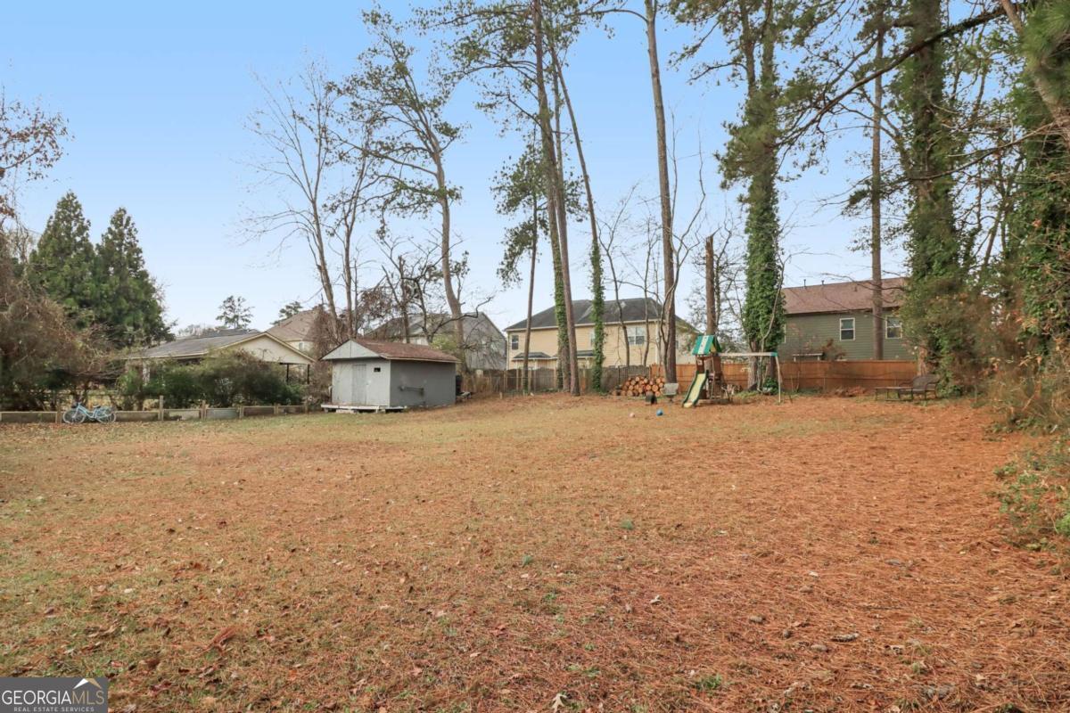 716 Carolina Roads Marietta, GA 30008 - Photo 50 of 54 a street view with large trees