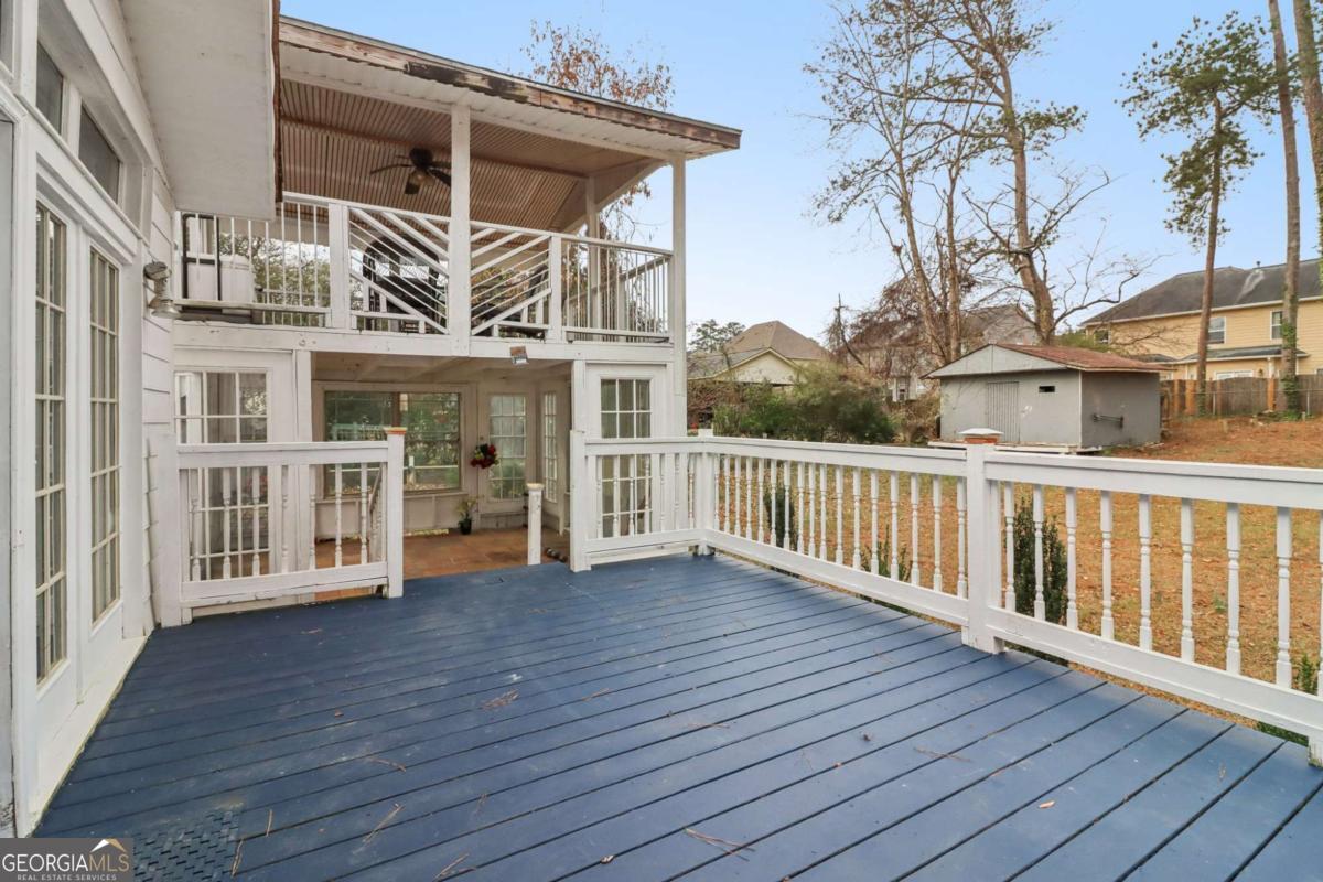 716 Carolina Roads Marietta, GA 30008 - Photo 53 of 54 a view of a house with wooden deck