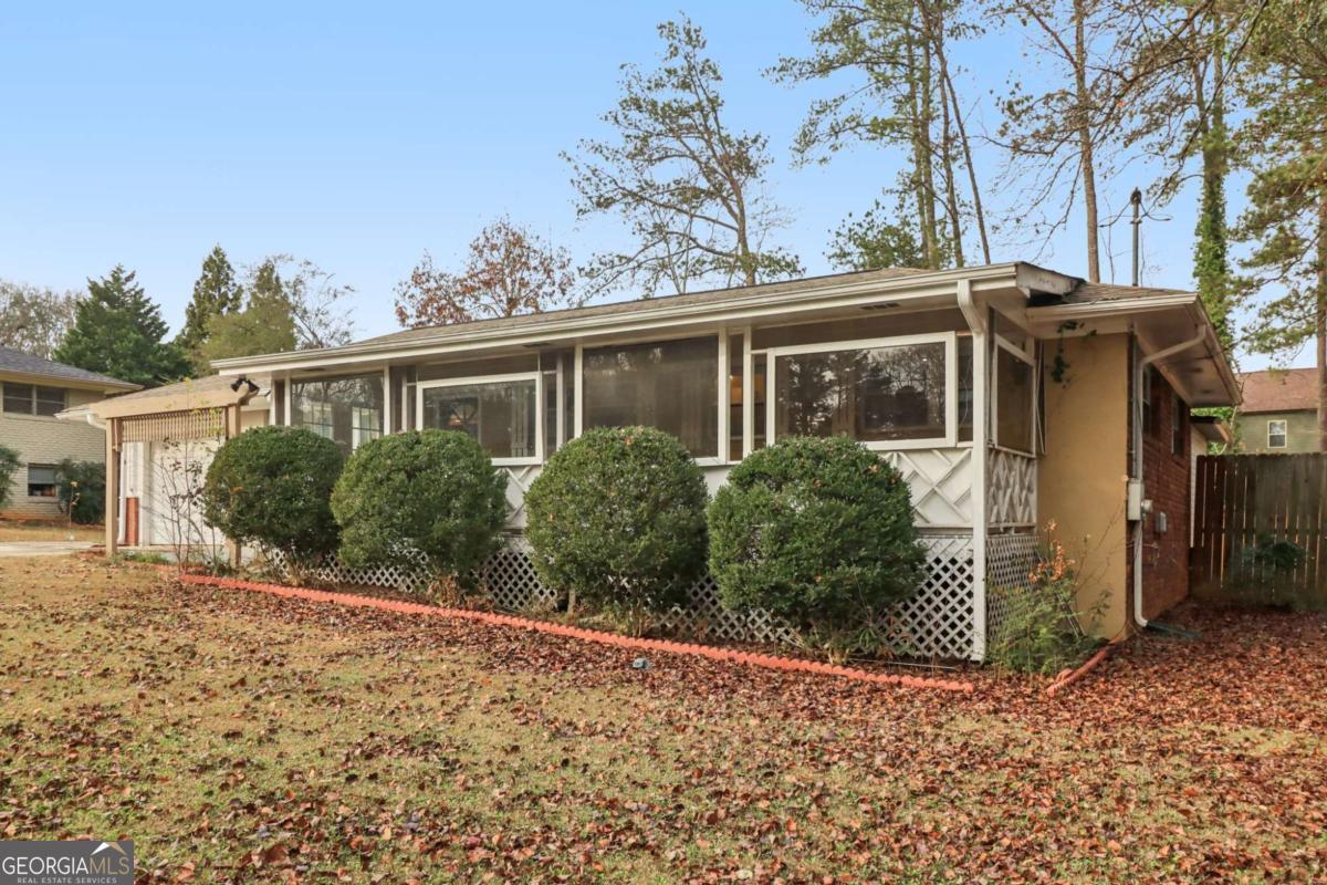 716 Carolina Roads Marietta, GA 30008 - Photo 6 of 54 a view of a house with a yard