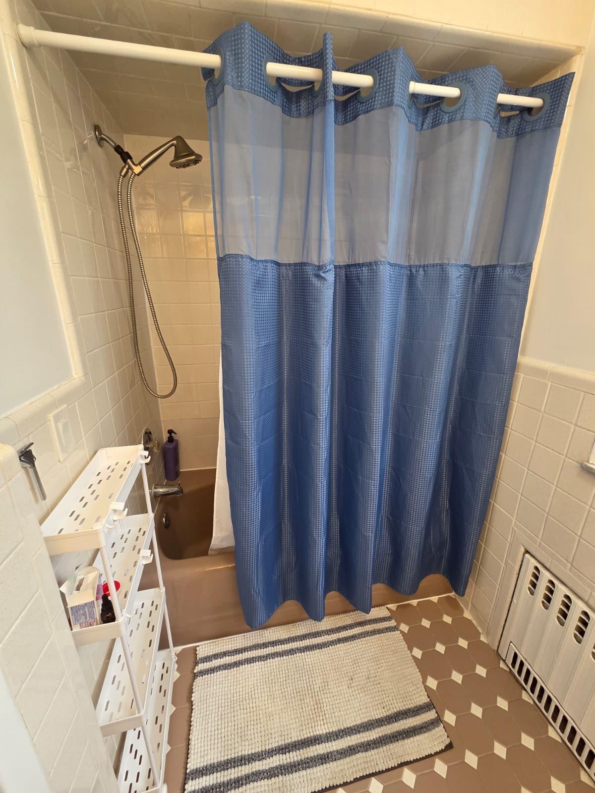 166 Carmita Avenue, Unit 2 Rutherford, NJ 07070 - Photo 17 of 27 a view of walk in closet with clothes and shoes