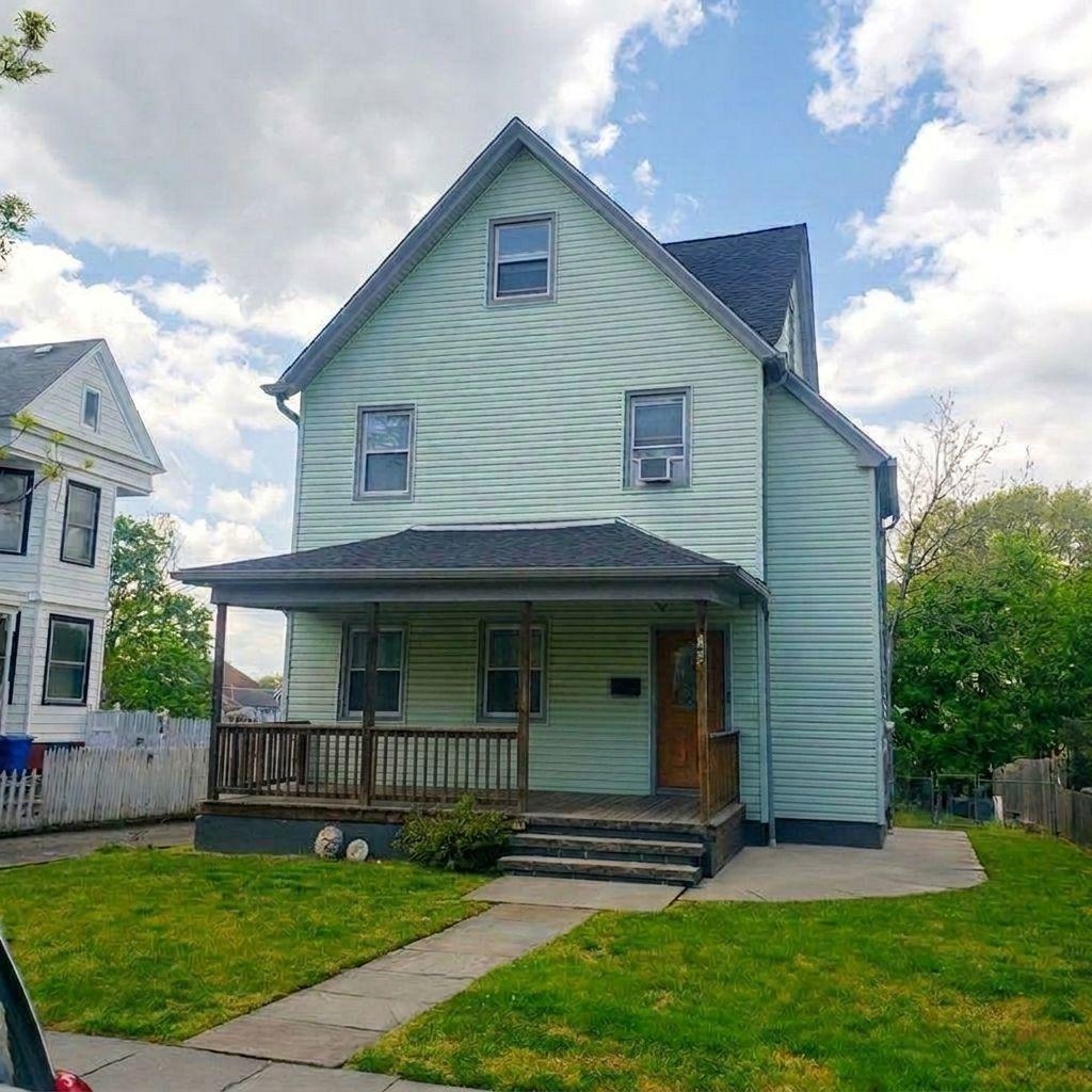 166 Carmita Avenue, Unit 2 Rutherford, NJ 07070 - Photo 27 of 27 a view of outdoor space yard and front view of a house