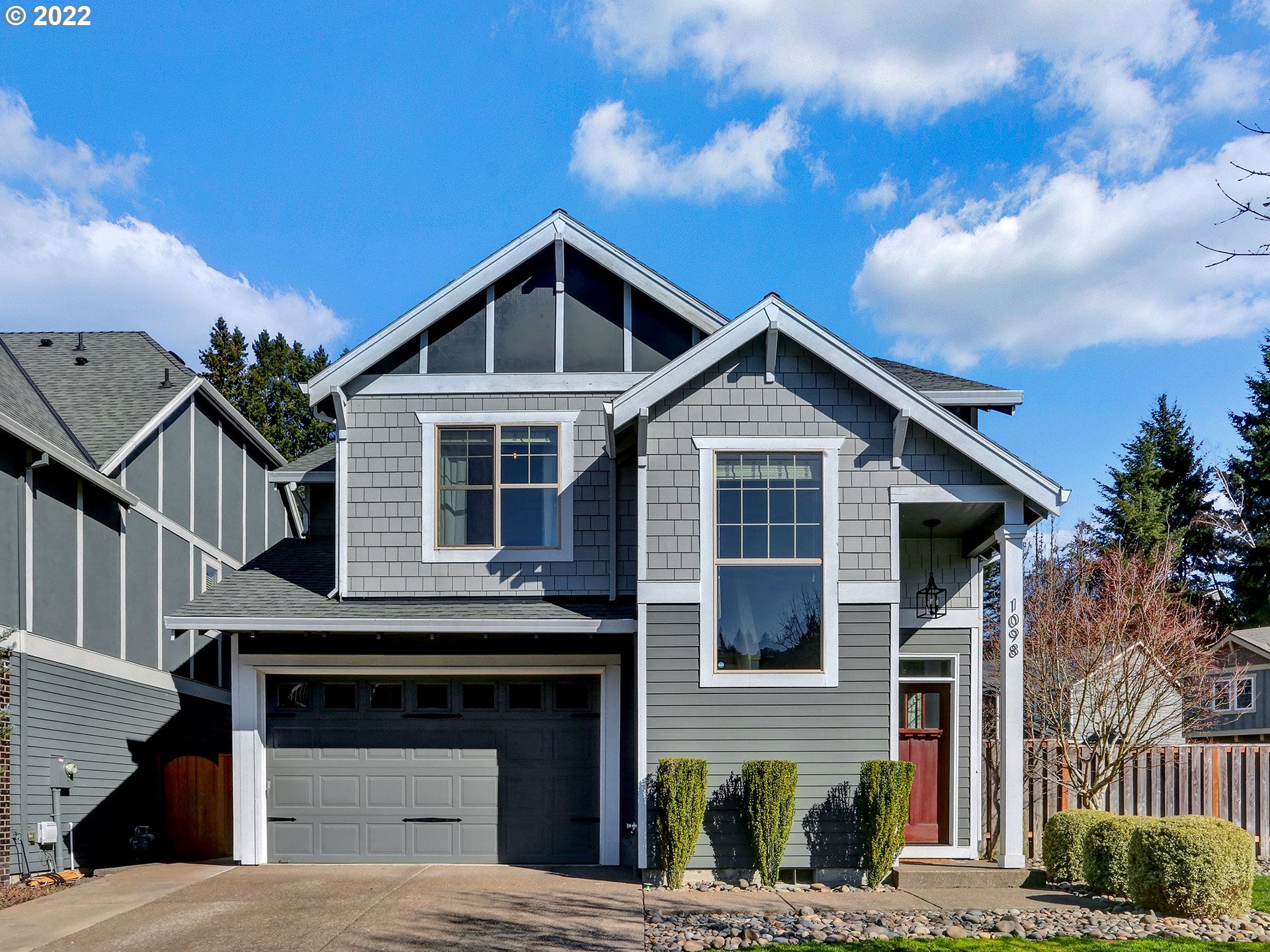 1098 Epperly Way West Linn, OR 97068 - Photo 1 of 32 a front view of a house with a garage