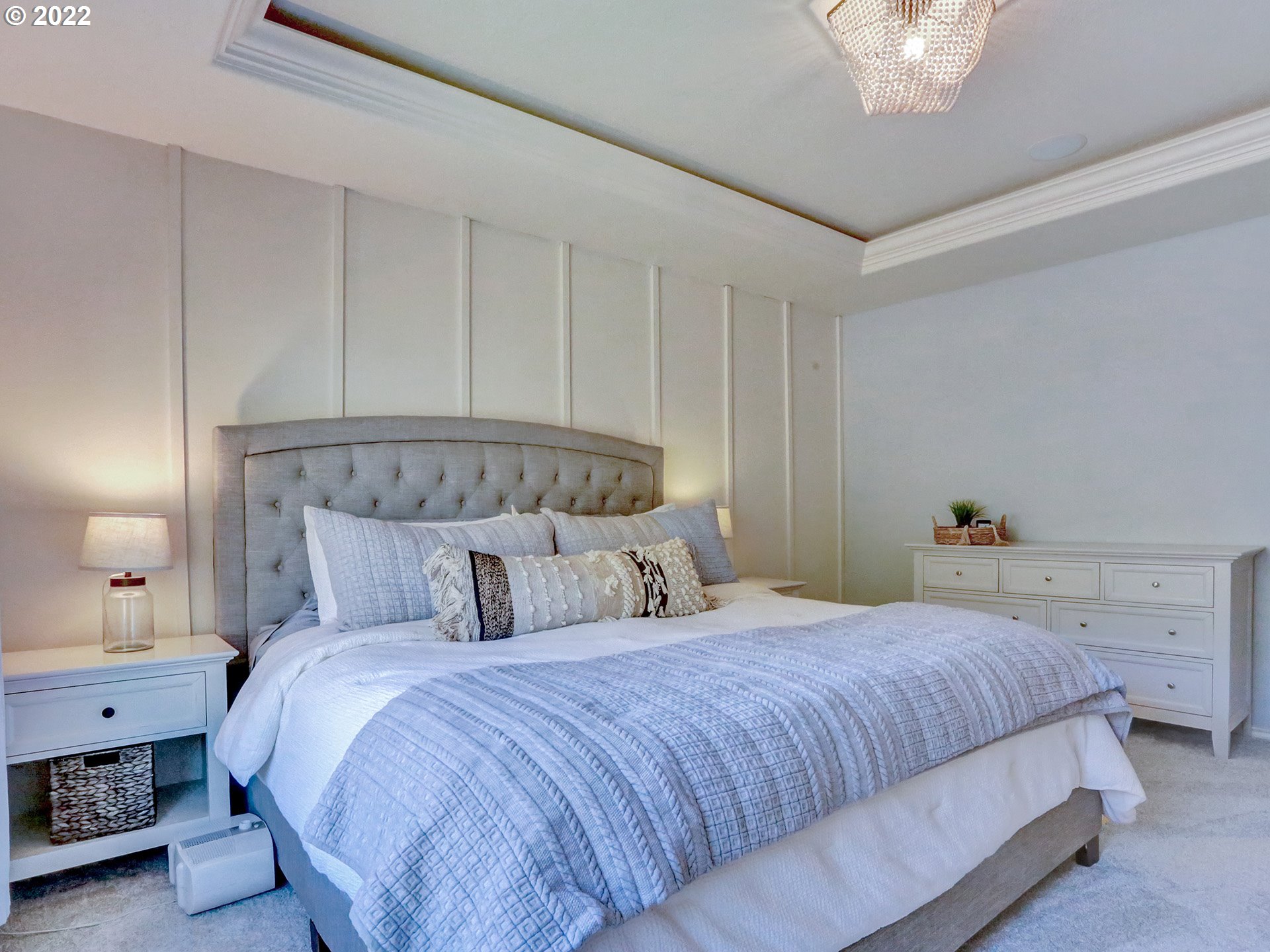 1098 Epperly Way West Linn, OR 97068 - Photo 17 of 32 a bedroom with a bed and a chandelier