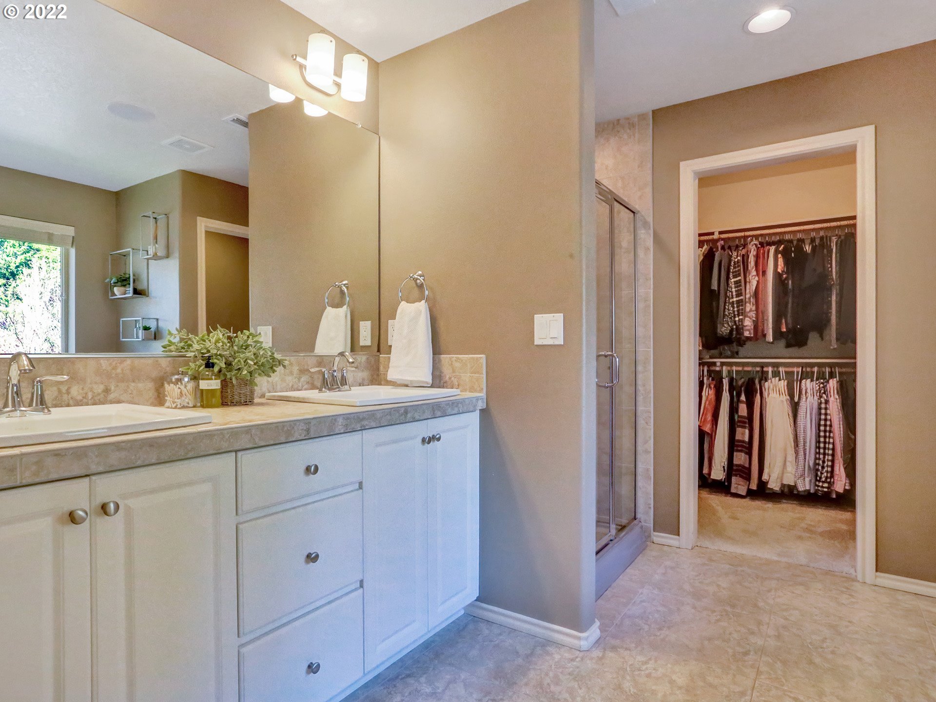 1098 Epperly Way West Linn, OR 97068 - Photo 19 of 32 a bathroom with a double vanity sink and a