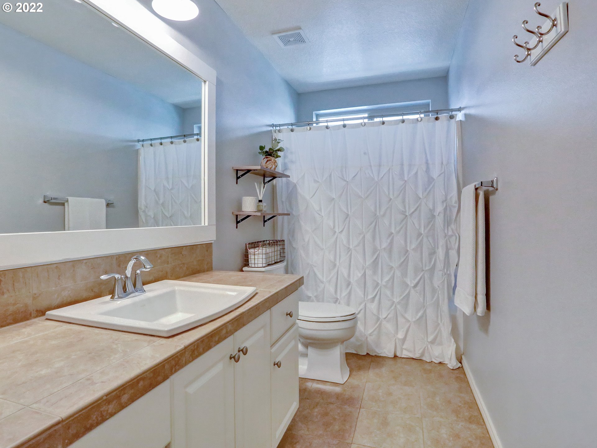 1098 Epperly Way West Linn, OR 97068 - Photo 24 of 32 a bathroom with a sink toilet and shower