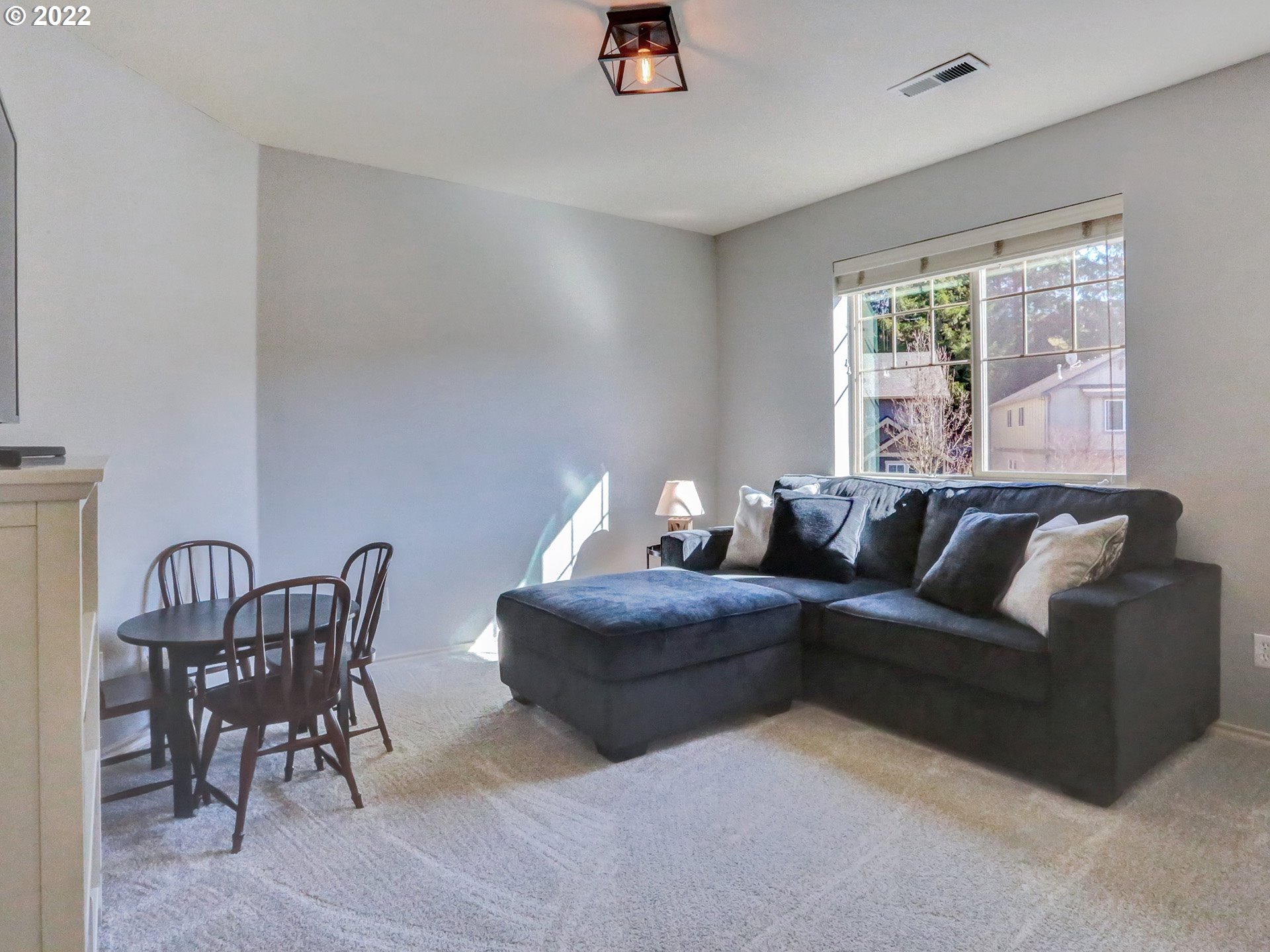 1098 Epperly Way West Linn, OR 97068 - Photo 26 of 32 a living room with furniture and a window