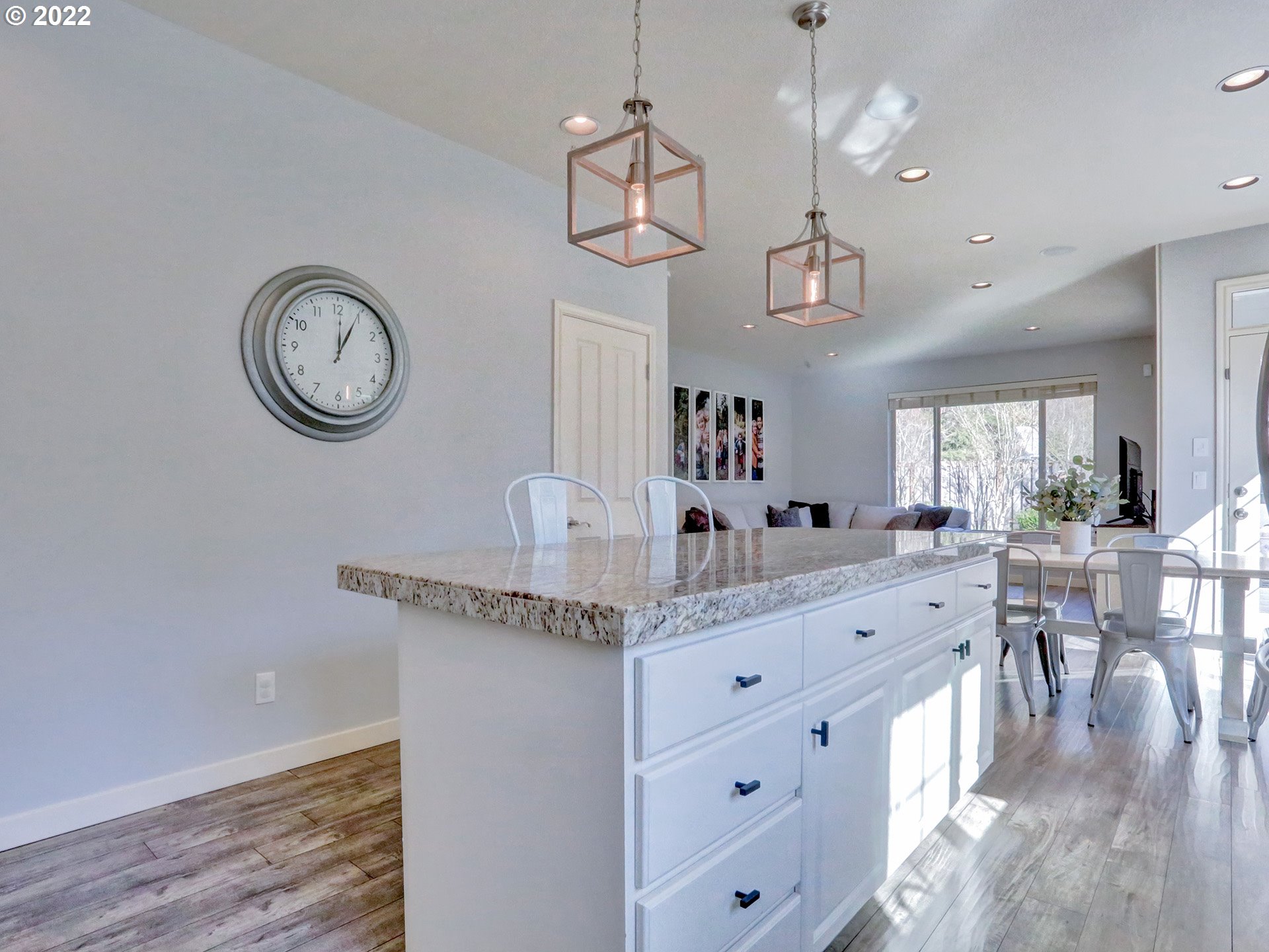 1098 Epperly Way West Linn, OR 97068 - Photo 7 of 32 a very nice looking room with kitchen island furniture and a chandelier