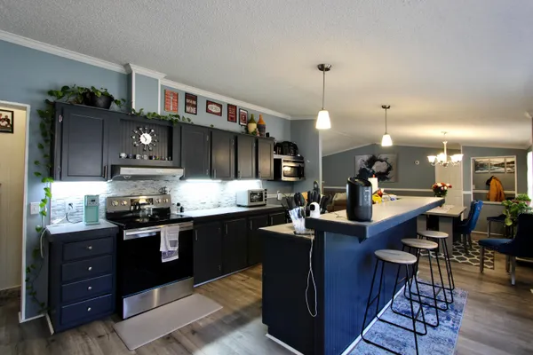 a kitchen with granite countertop lots of counter top space