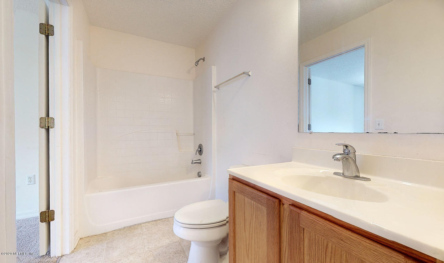 11939 Iron Creek Road Jacksonville, FL 32218 - Photo 21 of 45 a bathroom with a sink a toilet and shower