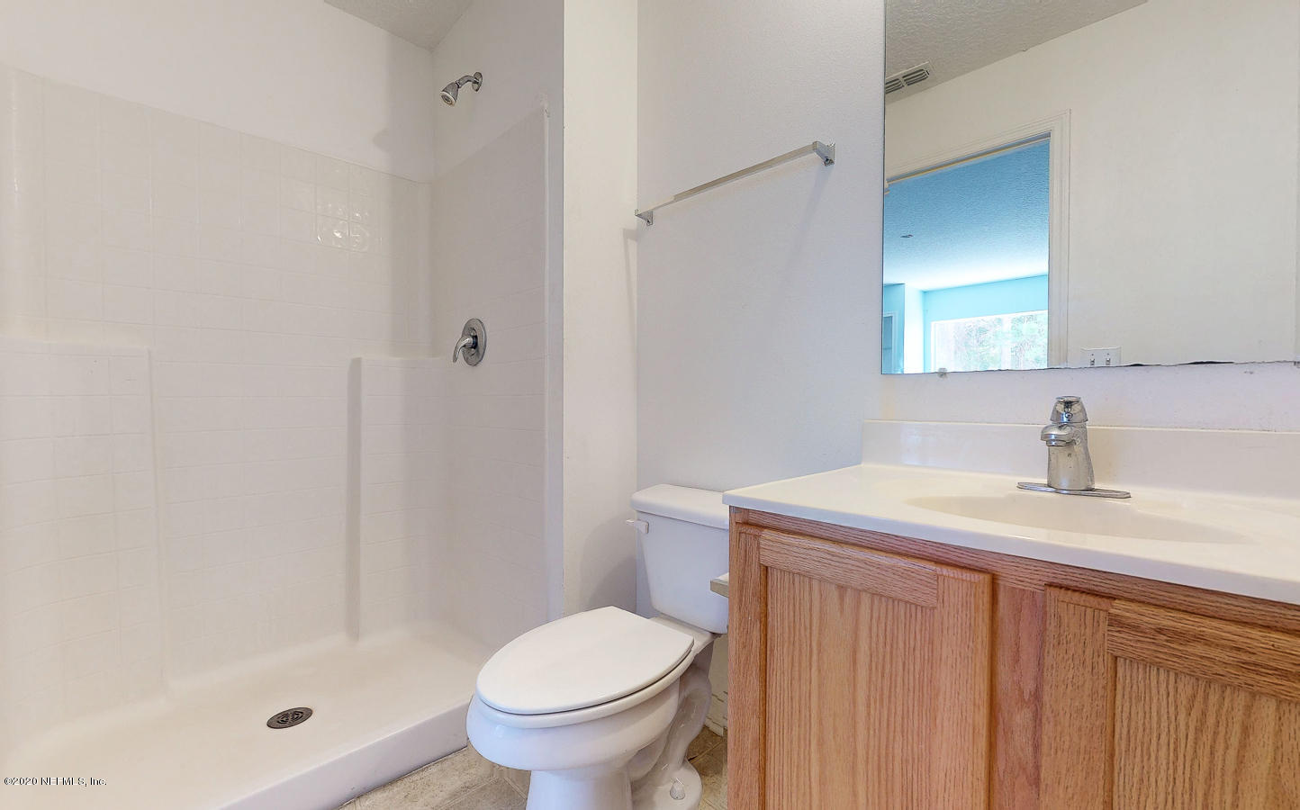 11939 Iron Creek Road Jacksonville, FL 32218 - Photo 24 of 45 a bathroom with a granite countertop sink toilet and shower