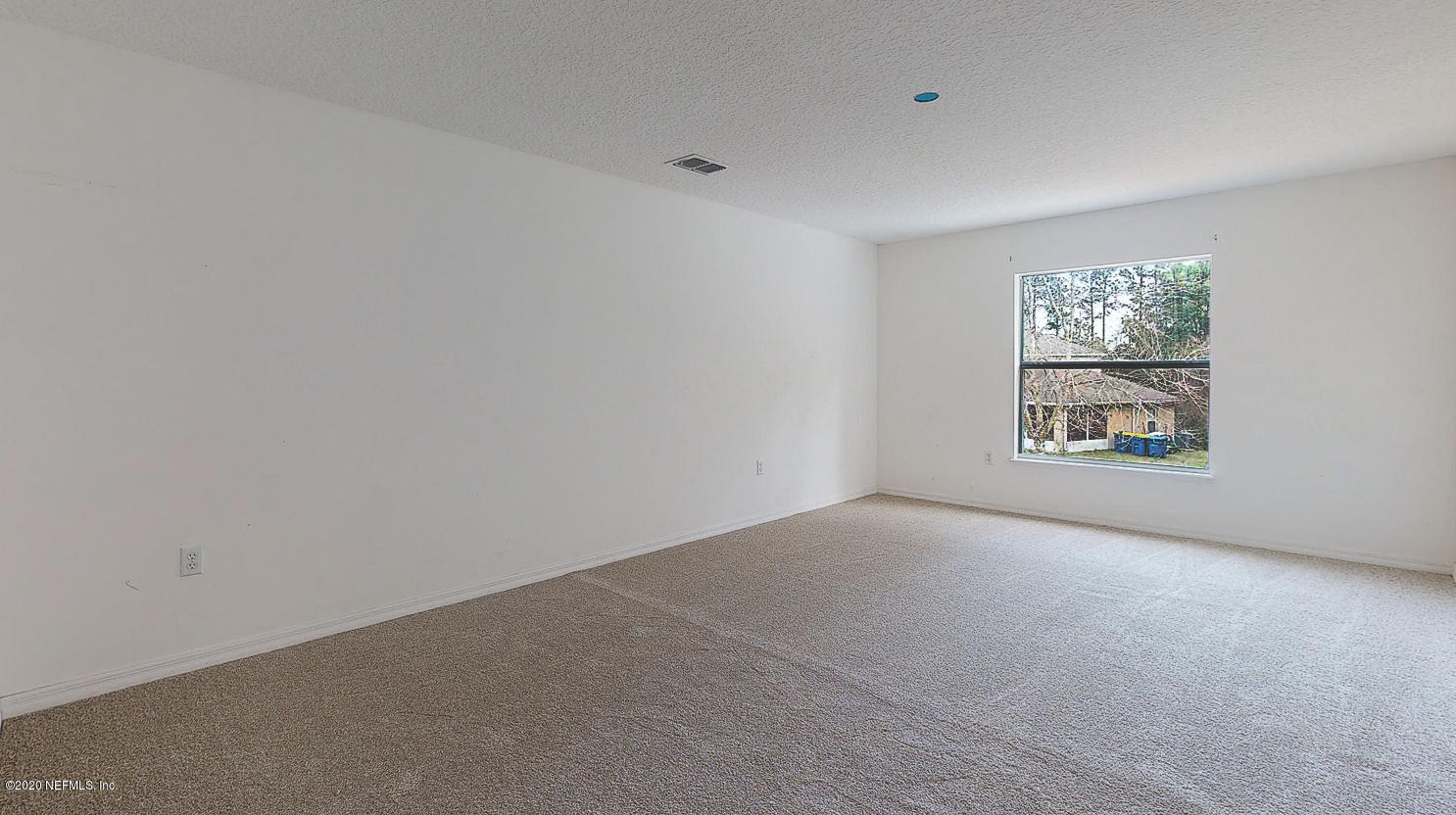 11939 Iron Creek Road Jacksonville, FL 32218 - Photo 25 of 45 an empty room with windows