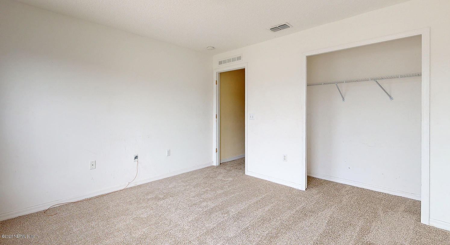 11939 Iron Creek Road Jacksonville, FL 32218 - Photo 29 of 45 an empty room with closet area