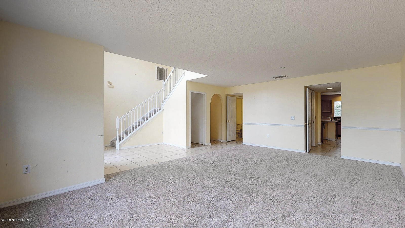 11939 Iron Creek Road Jacksonville, FL 32218 - Photo 4 of 45 a view of an empty room with closet and a window