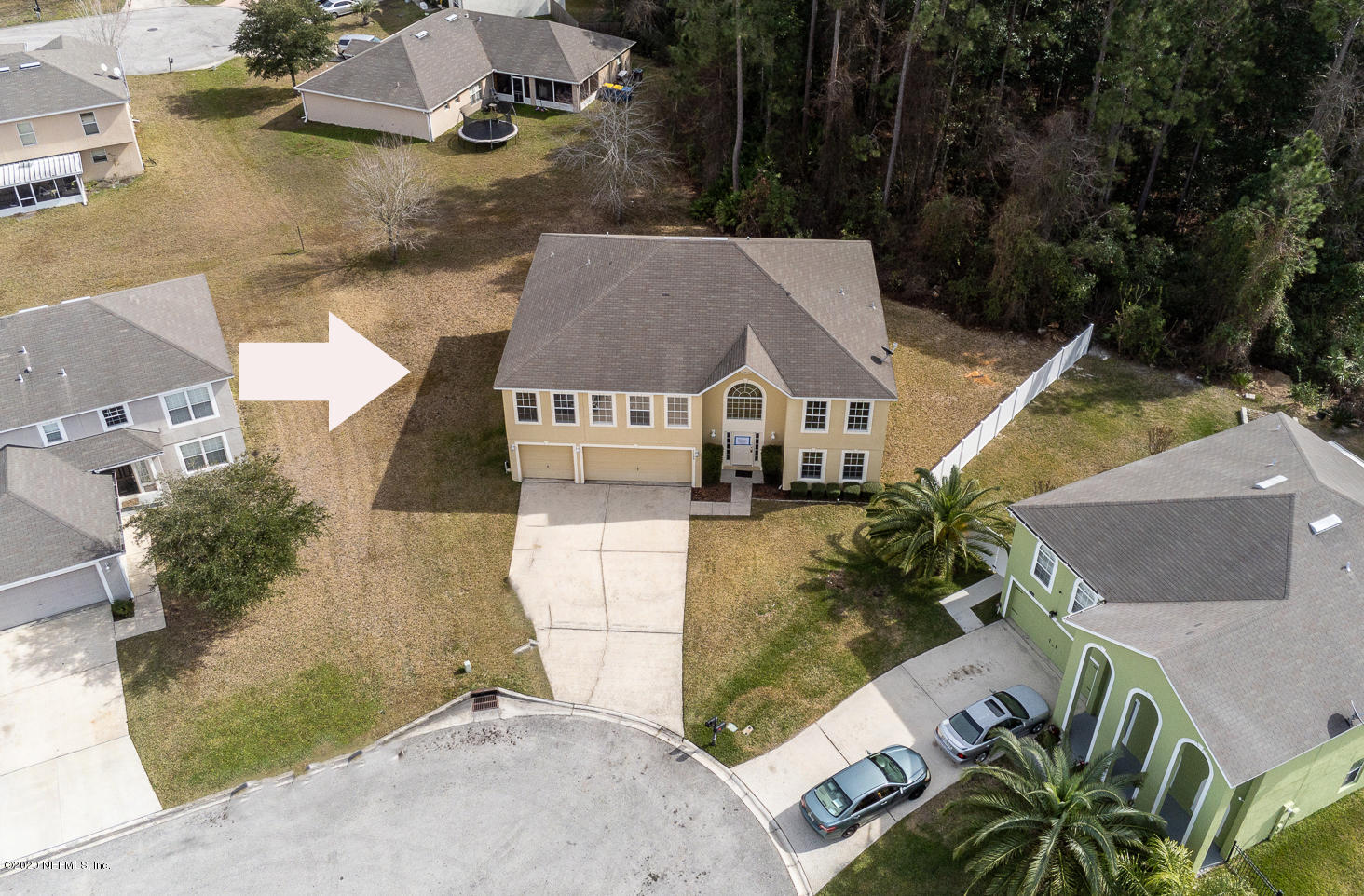 11939 Iron Creek Road Jacksonville, FL 32218 - Photo 39 of 45 an aerial view of a house with a yard