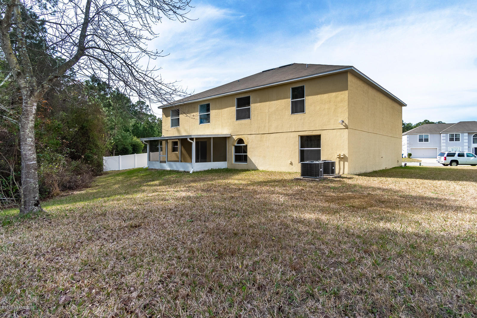 11939 Iron Creek Road Jacksonville, FL 32218 - Photo 41 of 45 a view of a house with backyard and trees