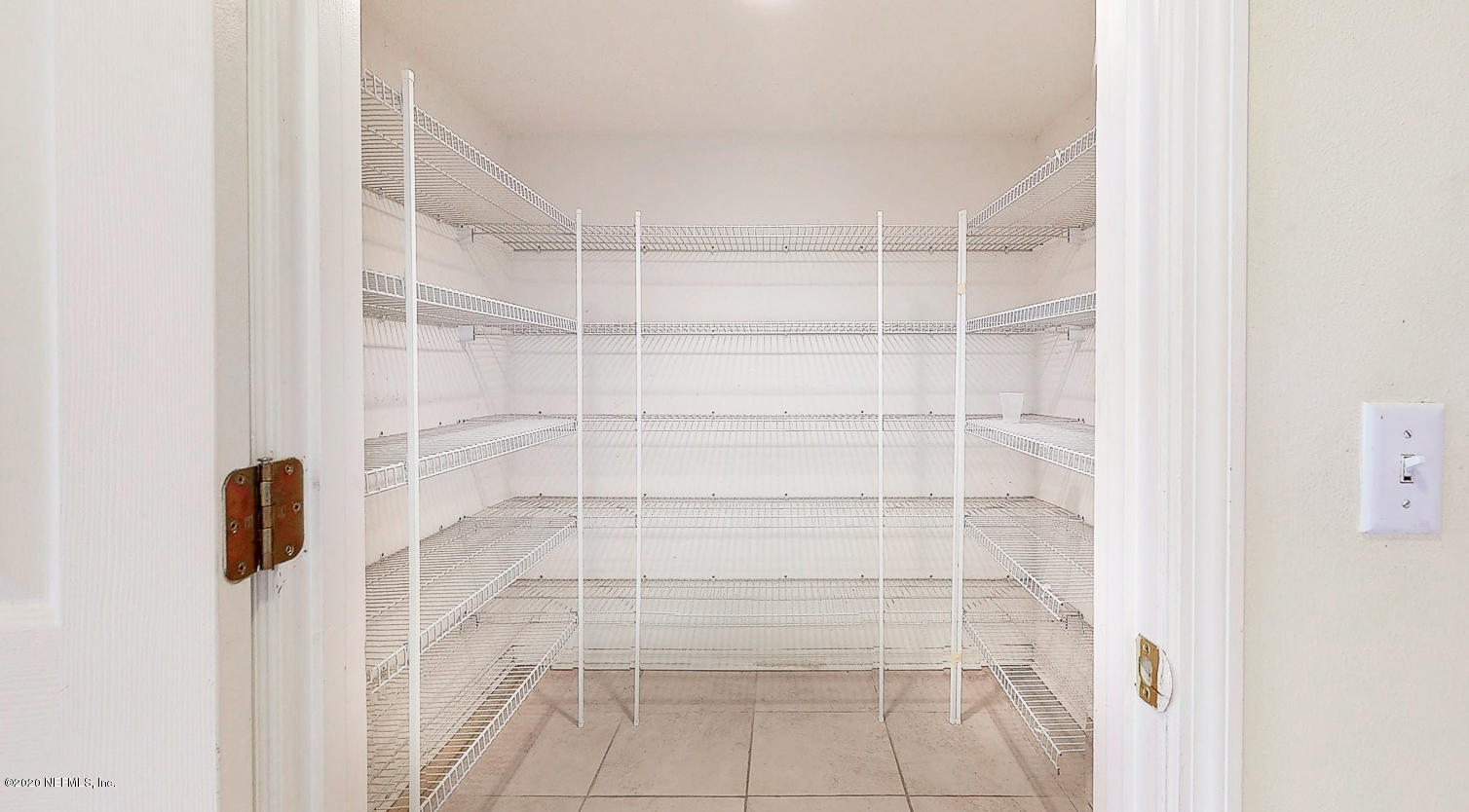11939 Iron Creek Road Jacksonville, FL 32218 - Photo 8 of 45 a view of a room with shelf