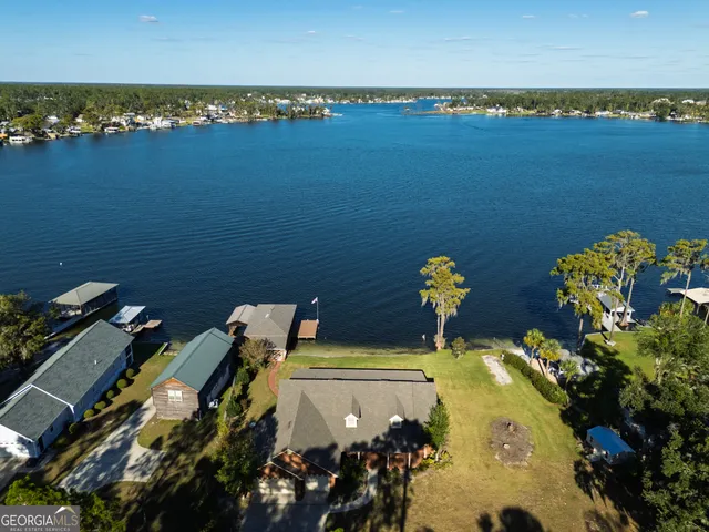 a view of a balcony with chairs