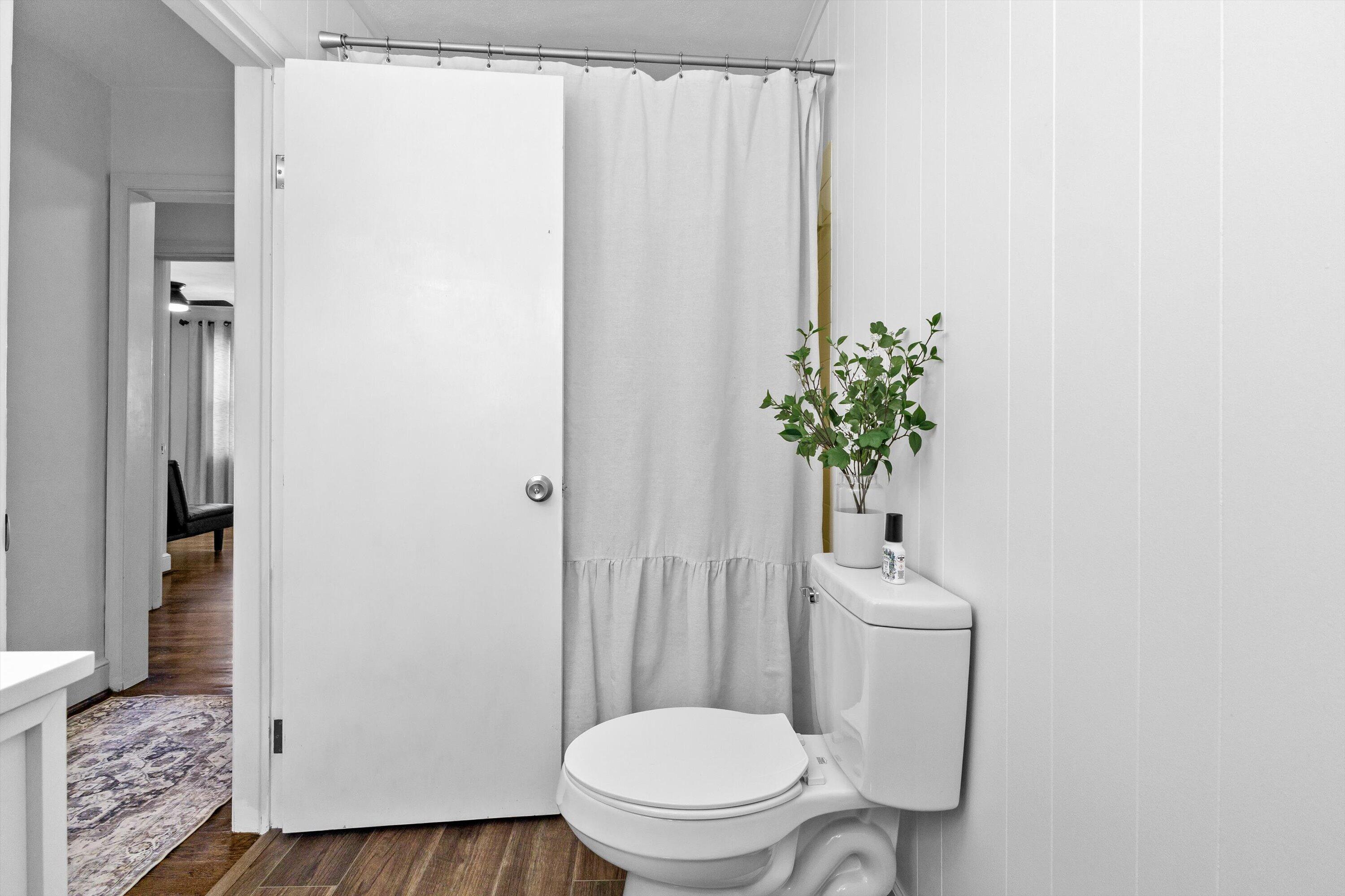 2650 Laburnum Avenue Southwest Roanoke, VA 24015 - Photo 20 of 37 a bathroom with a toilet a sink and a shower