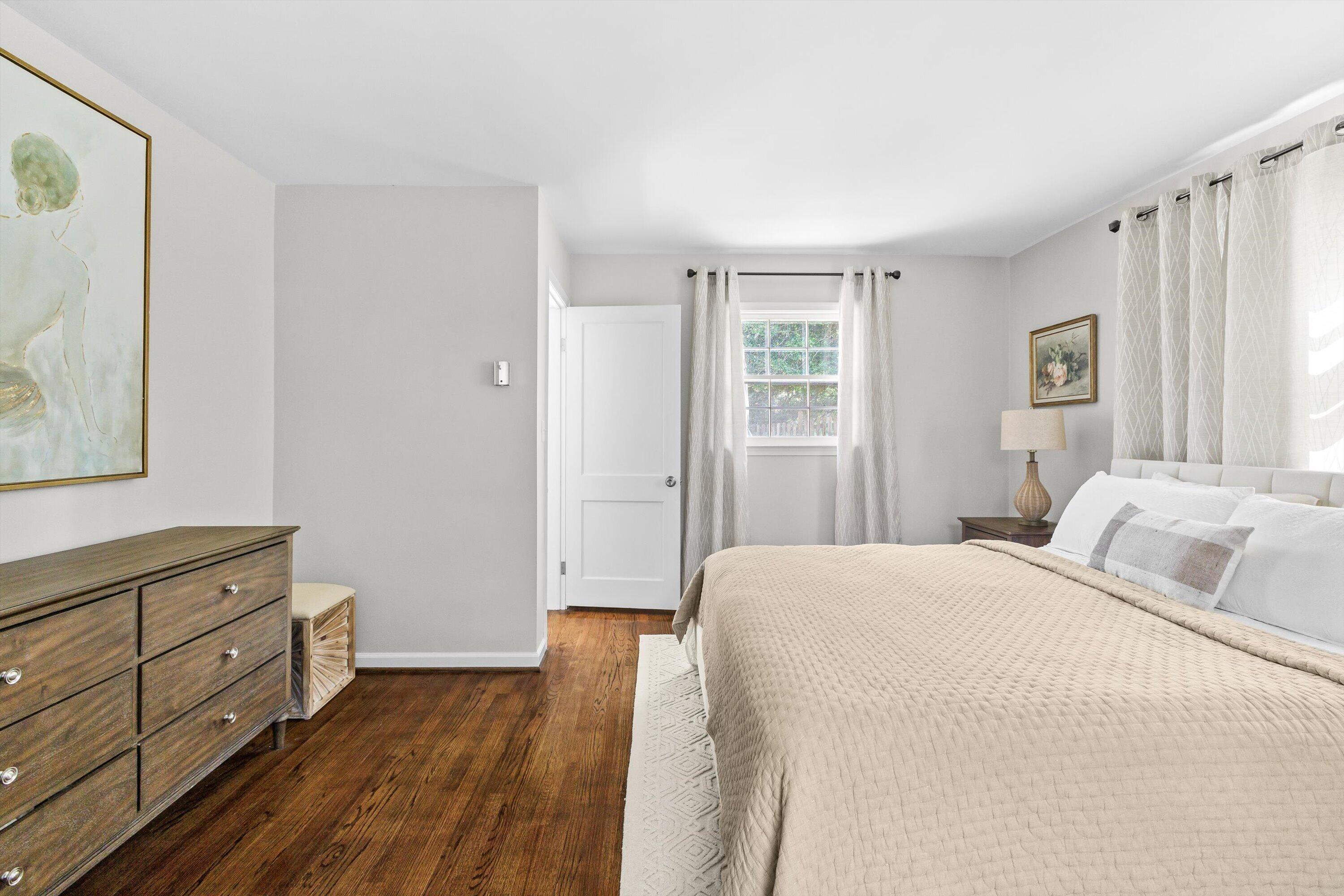 2650 Laburnum Avenue Southwest Roanoke, VA 24015 - Photo 23 of 37 a bedroom with a bed and a window
