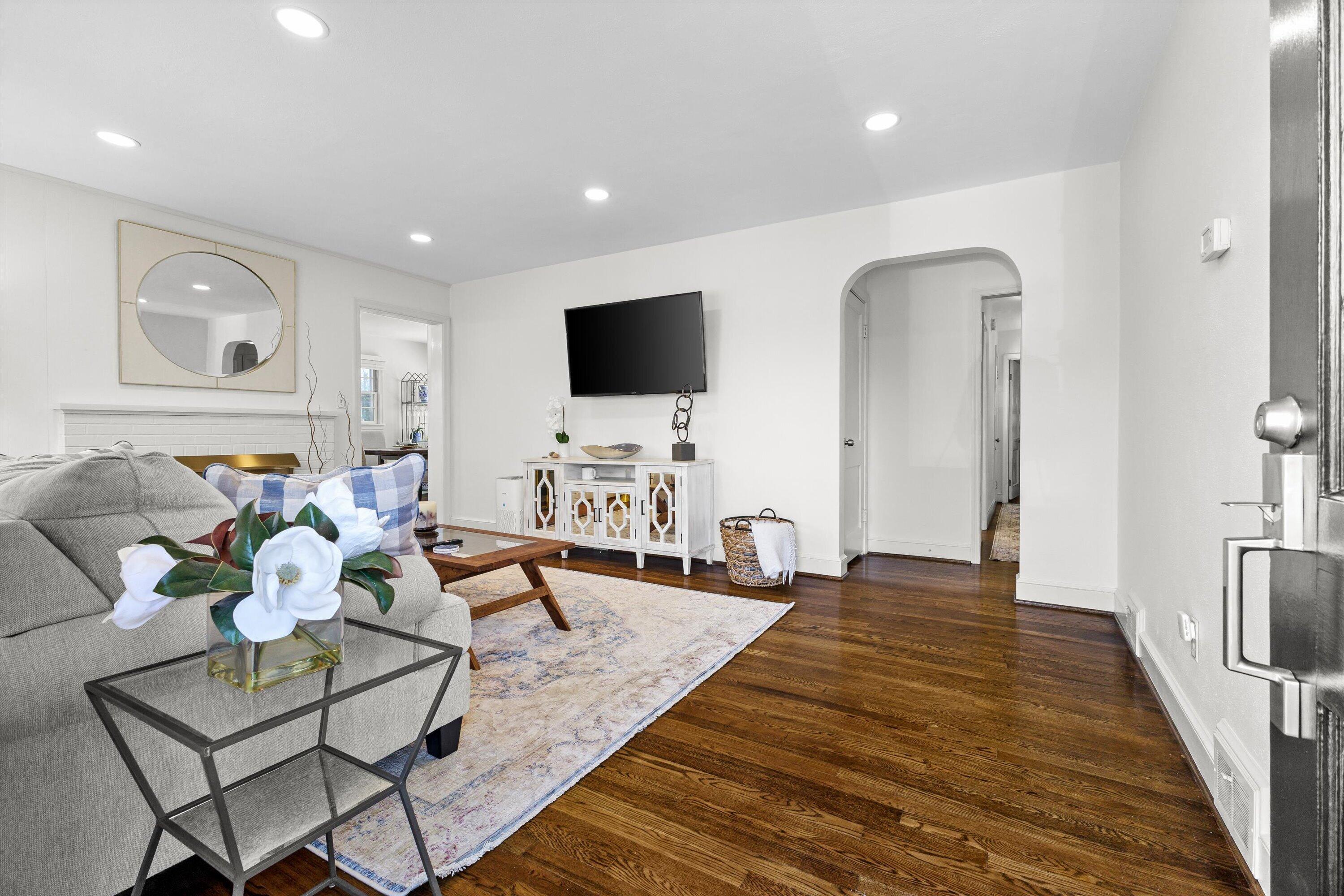 2650 Laburnum Avenue Southwest Roanoke, VA 24015 - Photo 6 of 37 a living room with furniture and a flat screen tv