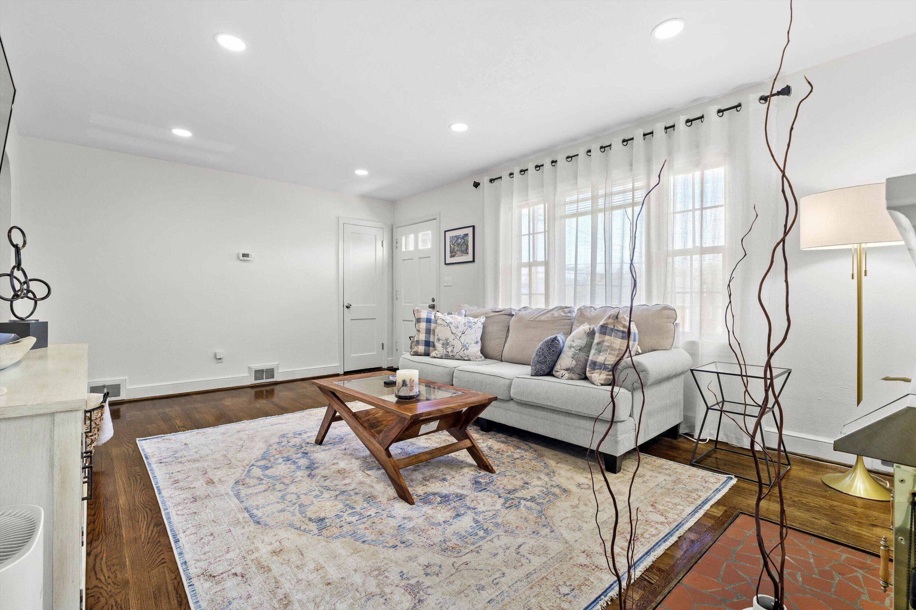 2650 Laburnum Avenue Southwest Roanoke, VA 24015 - Photo 7 of 37 a living room with furniture and a rug