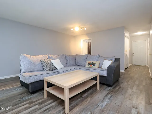 a living room with furniture and a couch