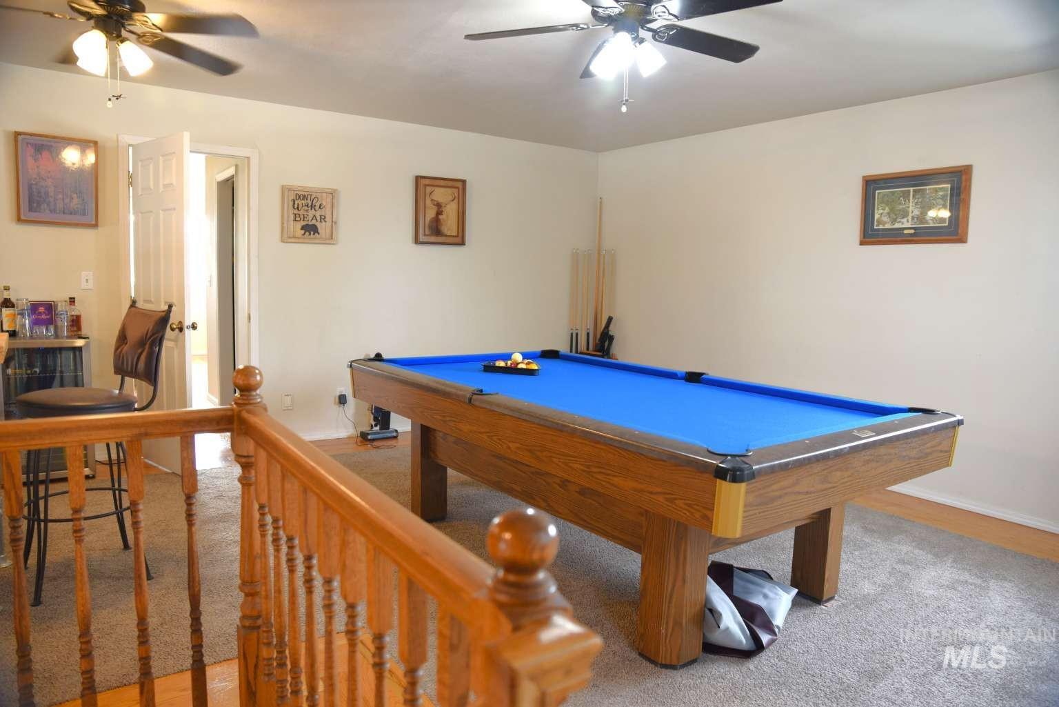 1065 Loafer Lane Weiser, ID 83672 - Photo 28 of 36 Rec room featuring ceiling fan, billiards table, and light carpet