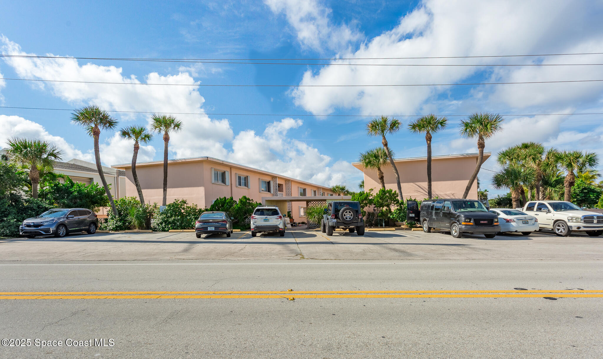 1700 Atlantic Street, Unit 9 Melbourne Beach, FL 32951 - Photo 16 of 30 a view of street with cars