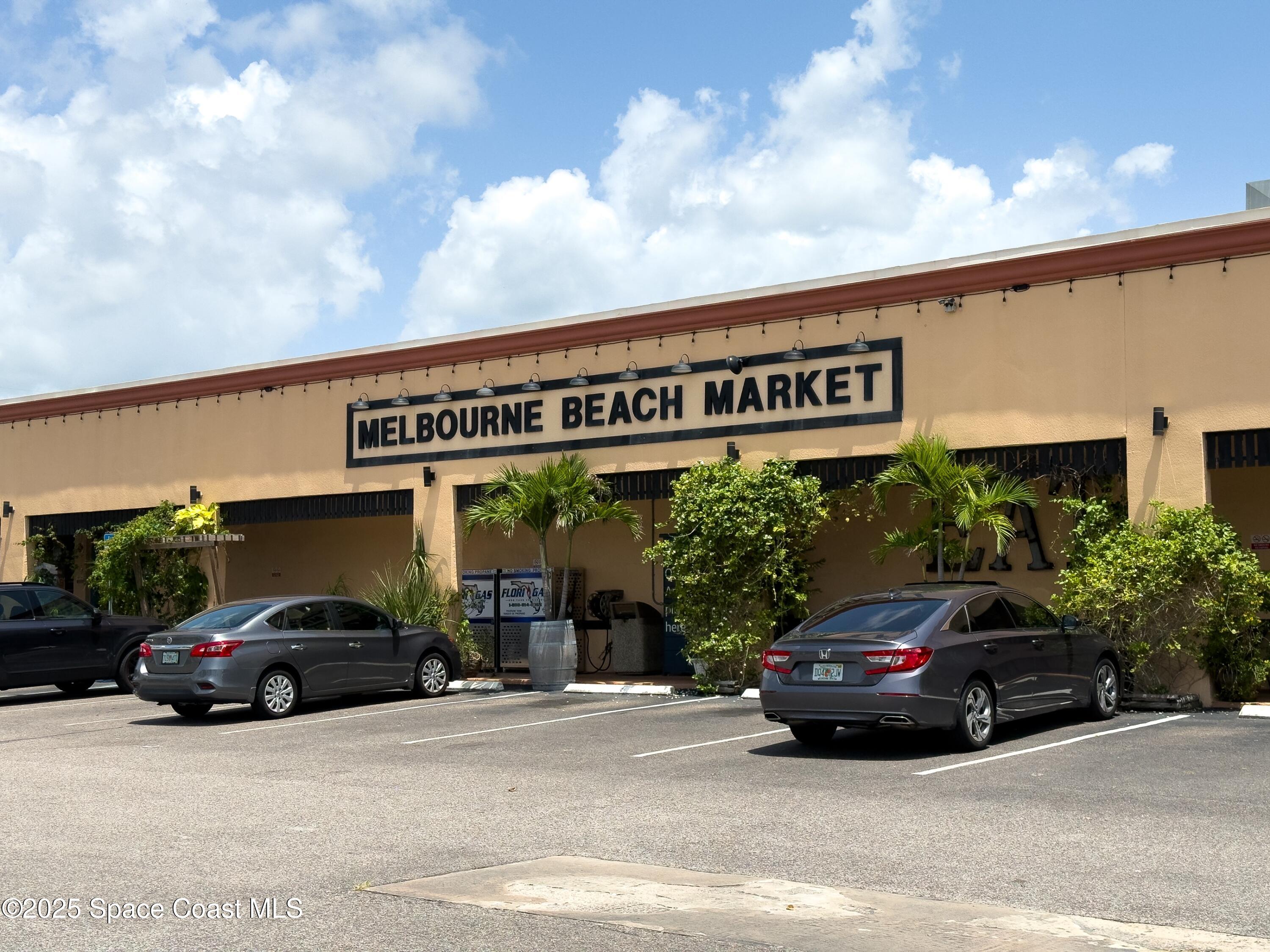 1700 Atlantic Street, Unit 9 Melbourne Beach, FL 32951 - Photo 28 of 30 a car parked in front of a building