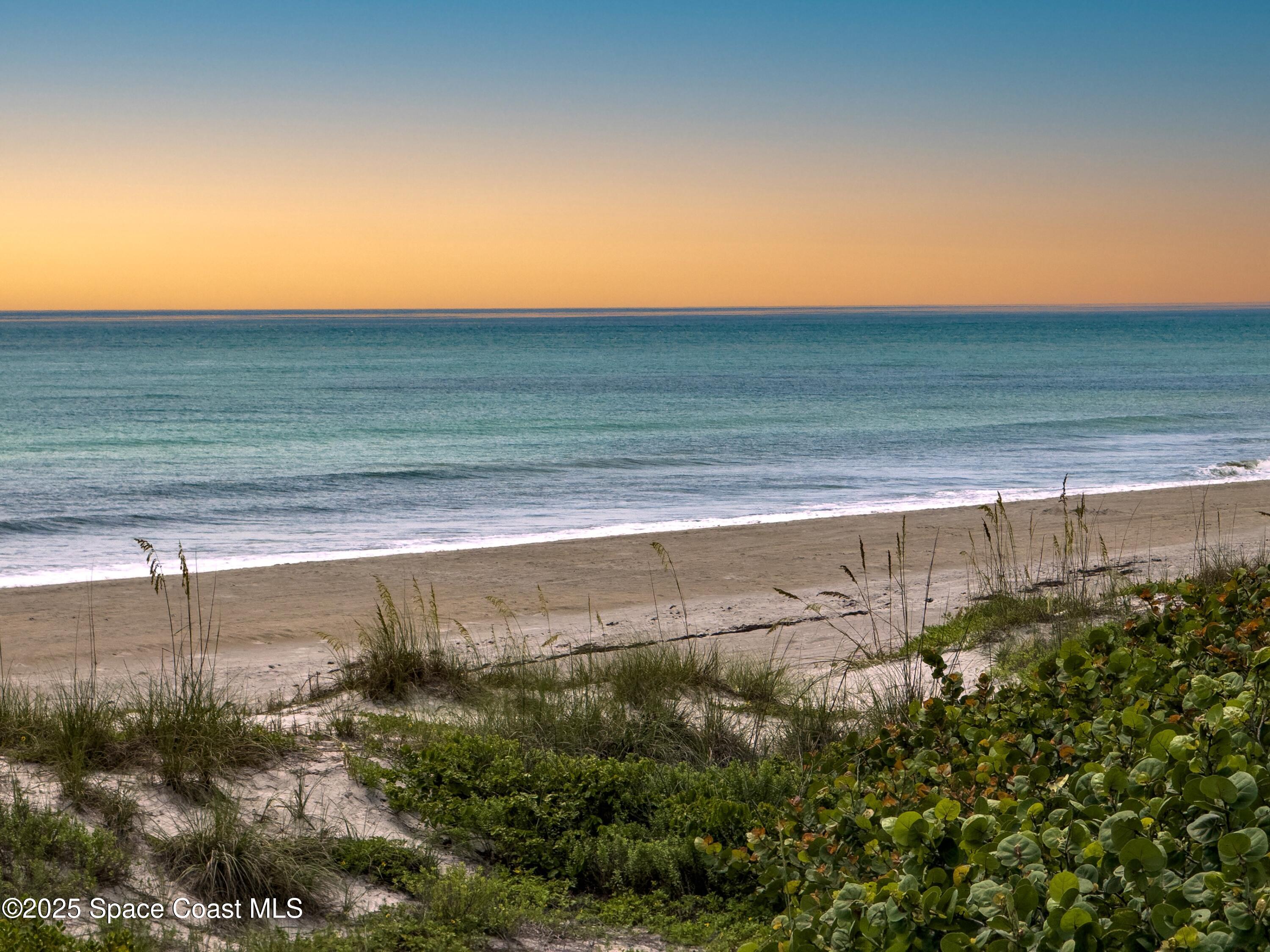 1700 Atlantic Street, Unit 9 Melbourne Beach, FL 32951 - Photo 5 of 30 a view of beach and ocean