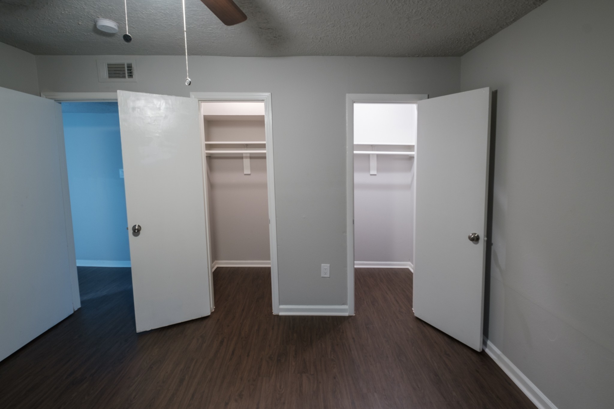 6519 Sloan Street, Unit 4 Houston, TX 77087 - Photo 8 of 11 a view of an empty room with wooden floor and a window