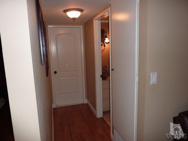 2430 Invar Court Simi Valley, CA 93065 - Photo 11 of 26 a view of a hallway with wooden floor